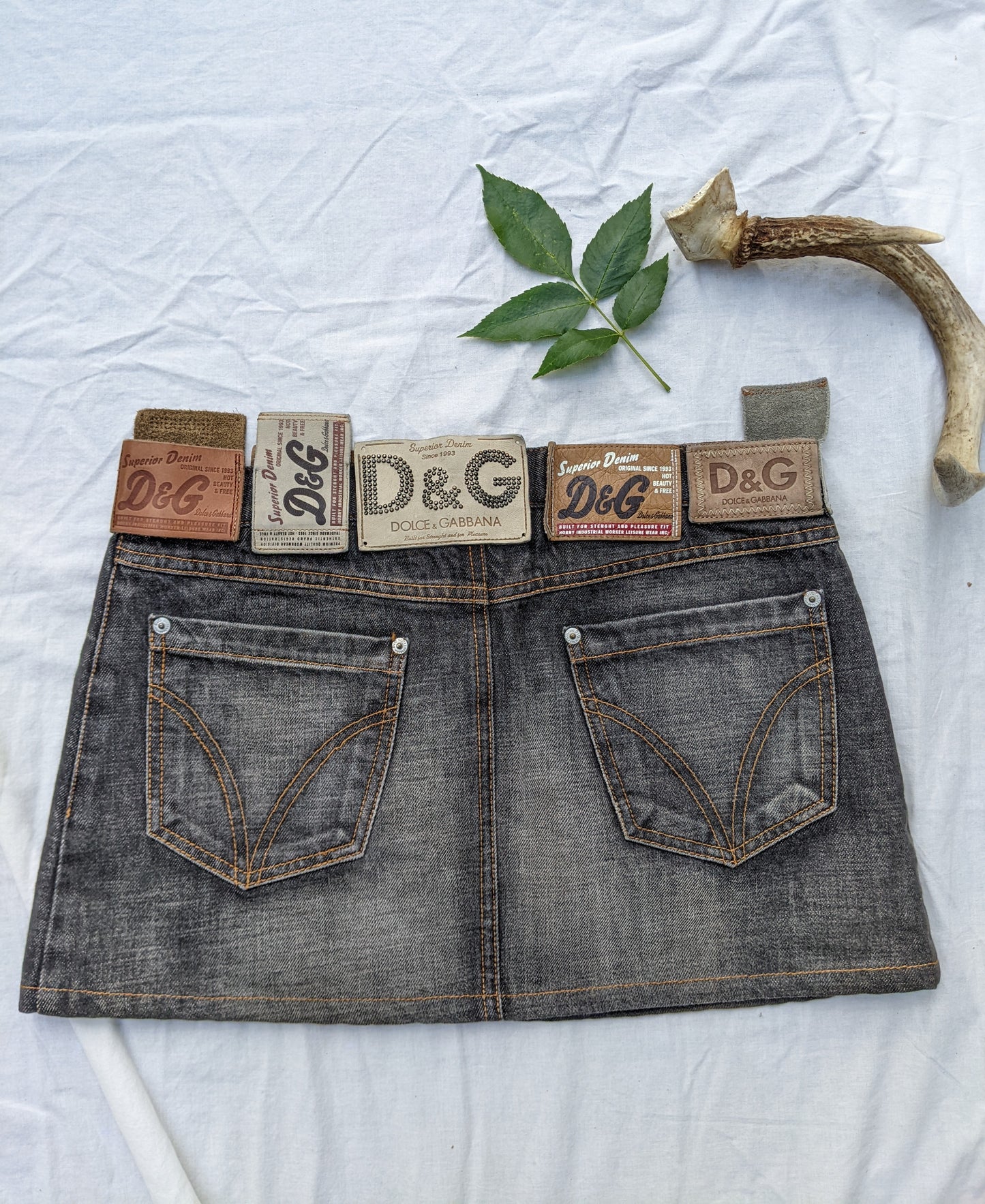 Dolce & Gabbana denim skirt with leather patches. Fits 6/8