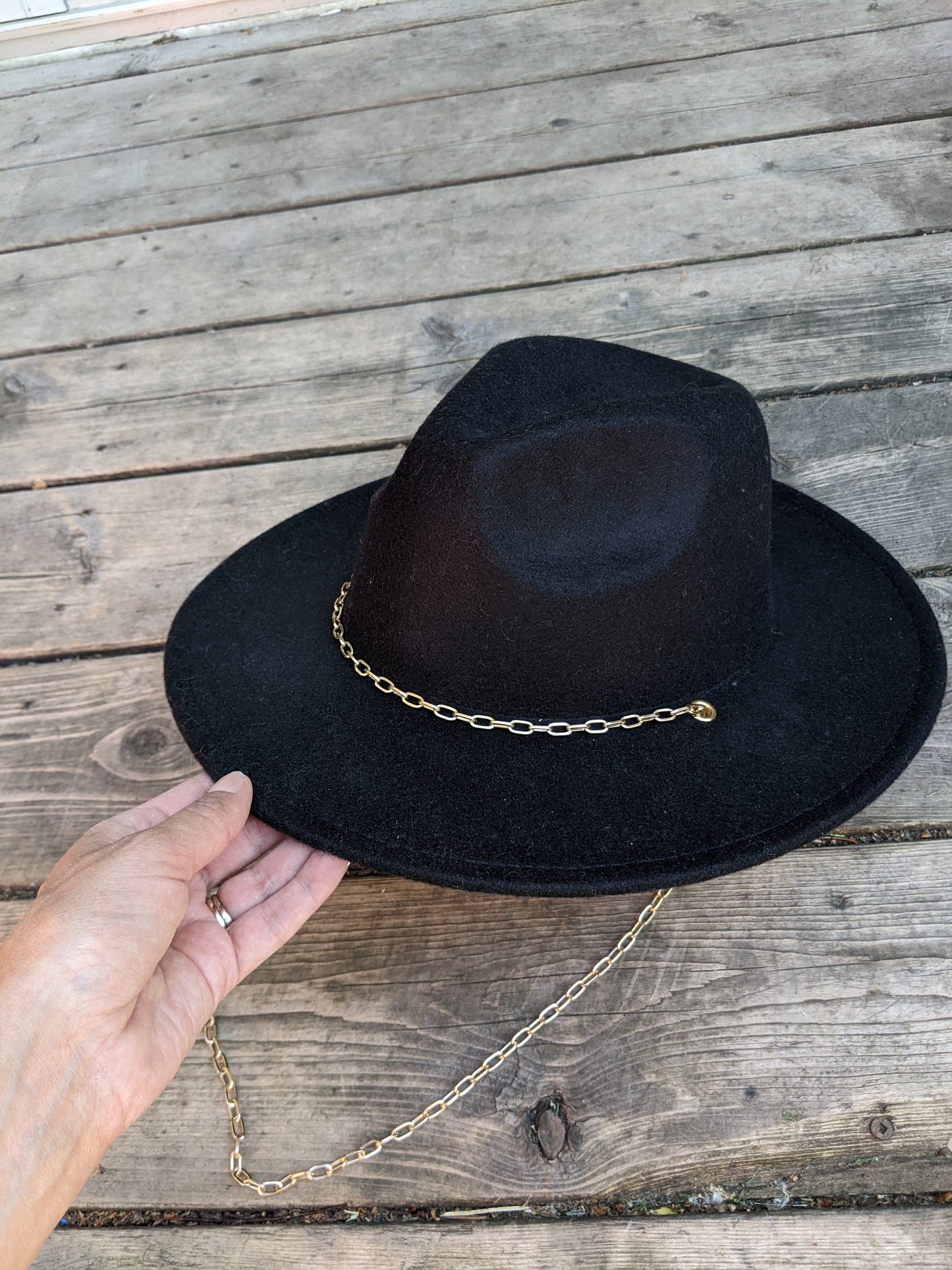 Black felt cowboy hat with gold chain