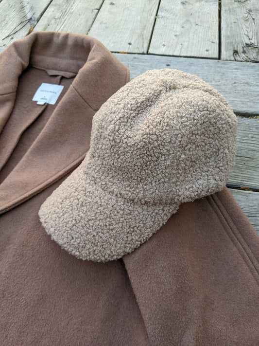 No tags shearling hat. Adjustable back