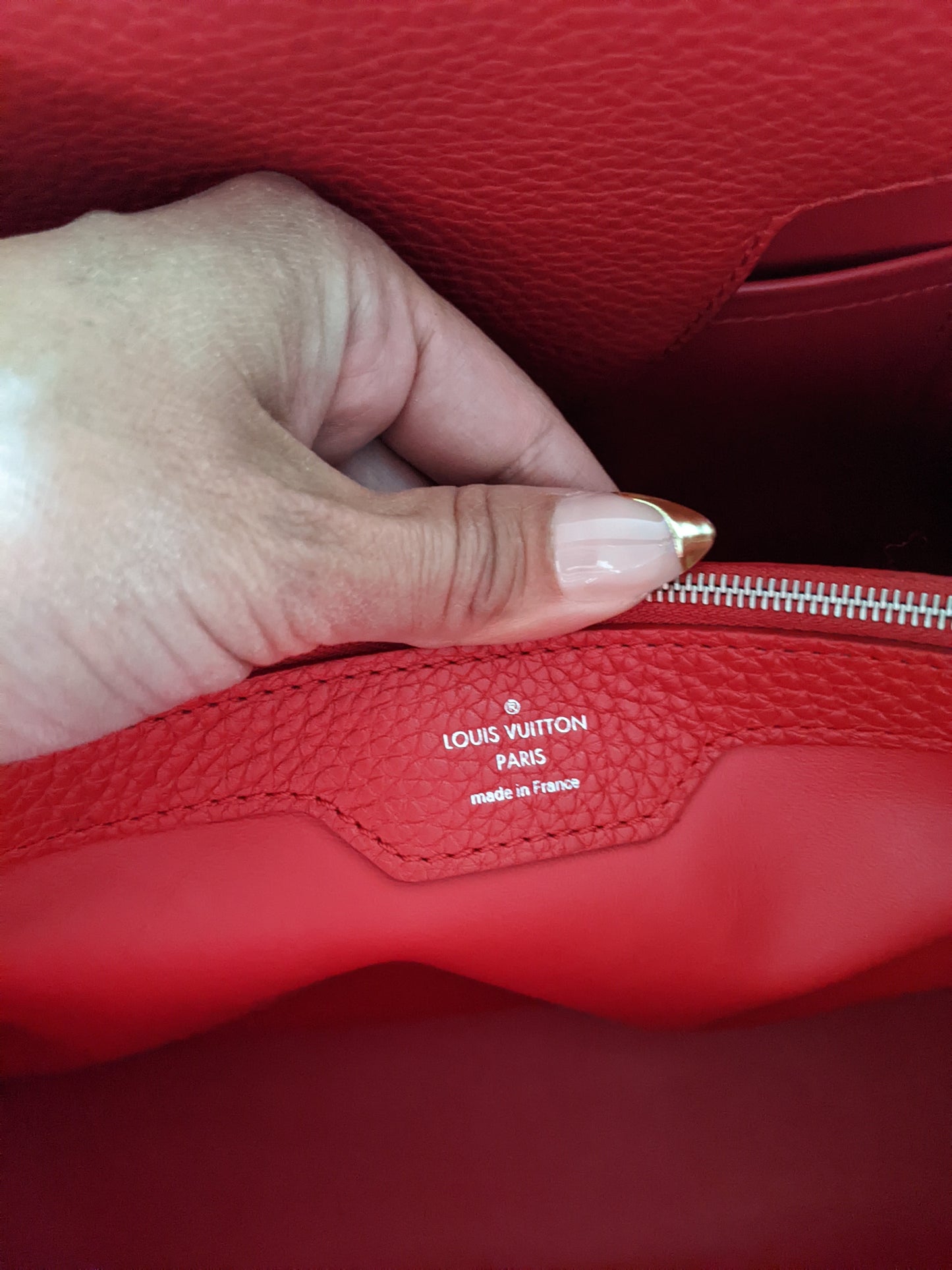 Louis Vuitton Capucines MM two way bag in Ruby Red.