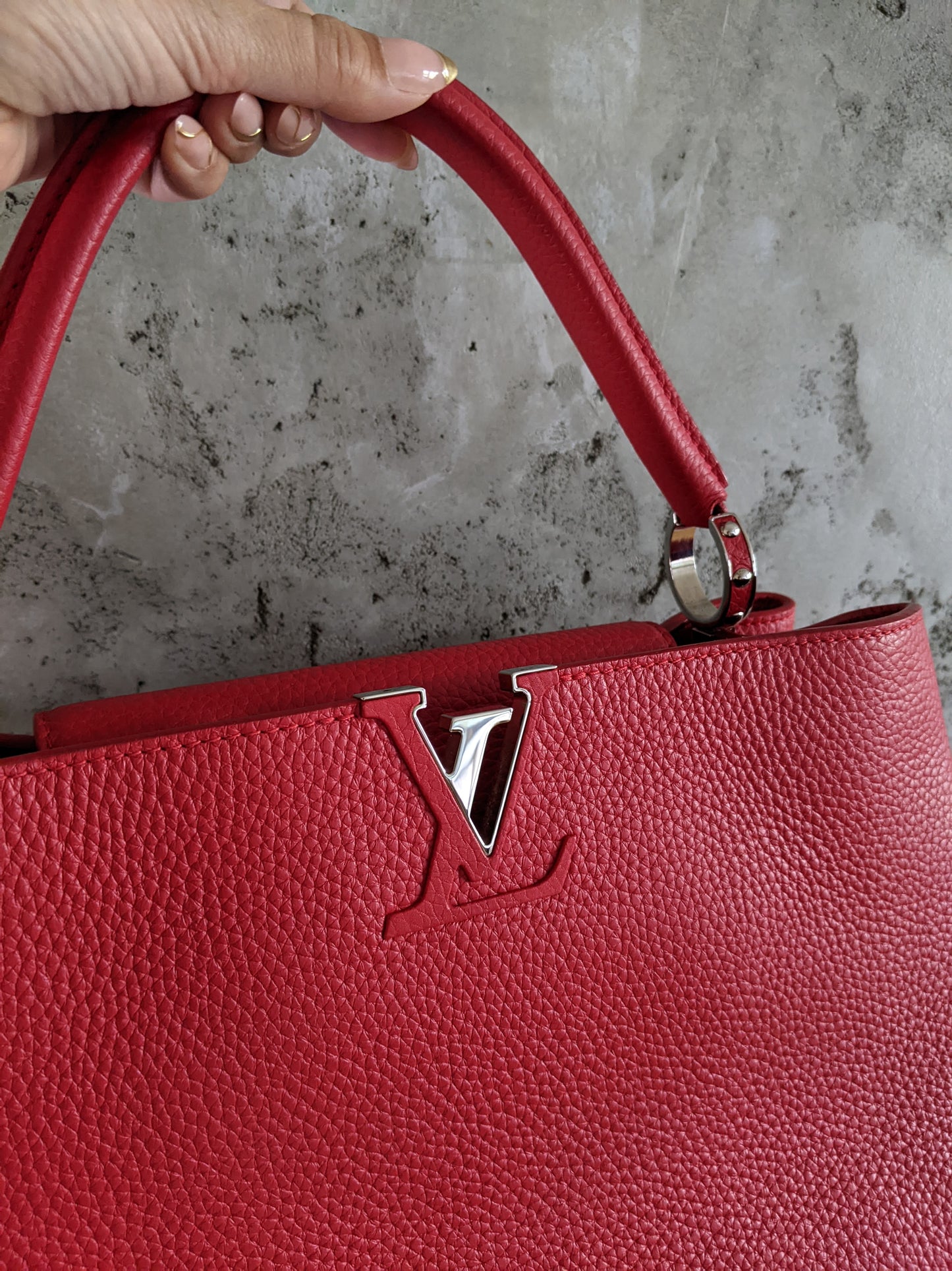 Louis Vuitton Capucines MM two way bag in Ruby Red.