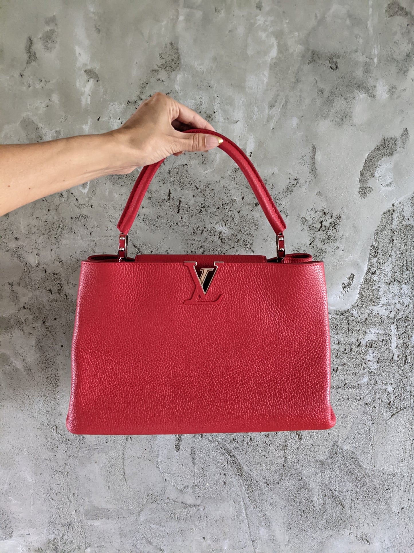 Louis Vuitton Capucines MM two way bag in Ruby Red.