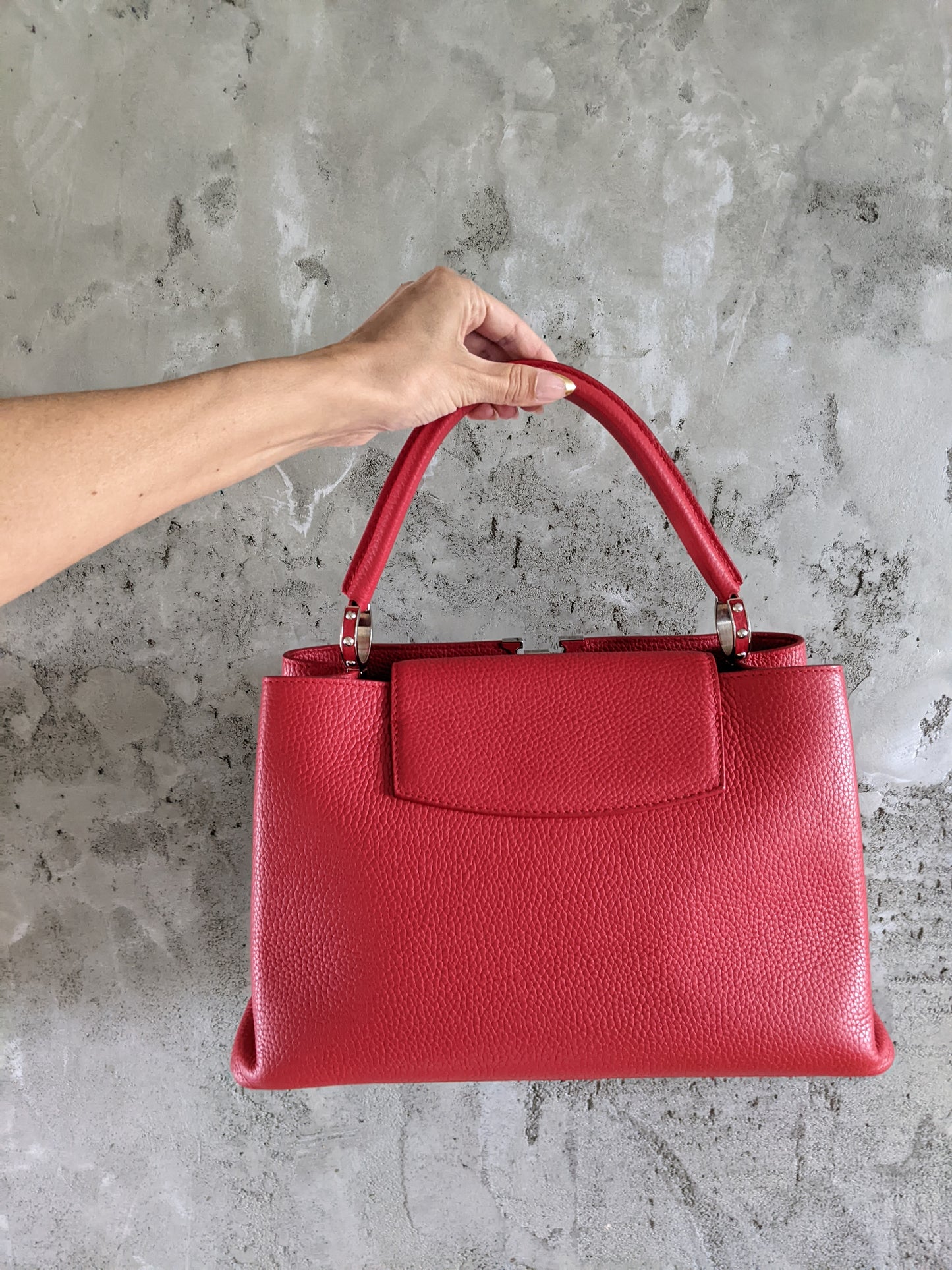 Louis Vuitton Capucines MM two way bag in Ruby Red.